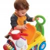 Fisher Price Jeździk muzyczna parada żółty